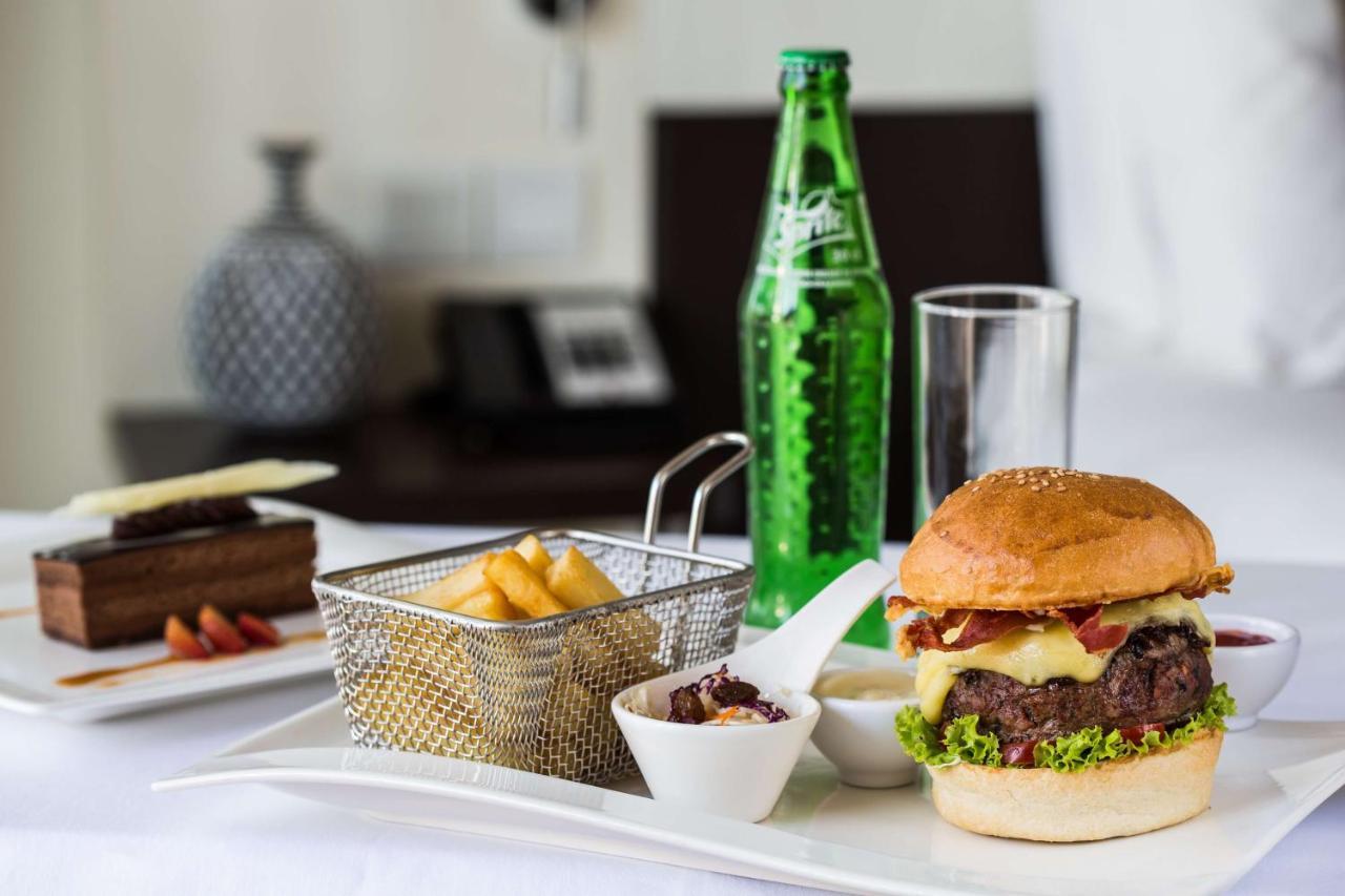 Radisson Blu Hotel & Convention Centre Κιγκάλι Εξωτερικό φωτογραφία A bottle of Sprite